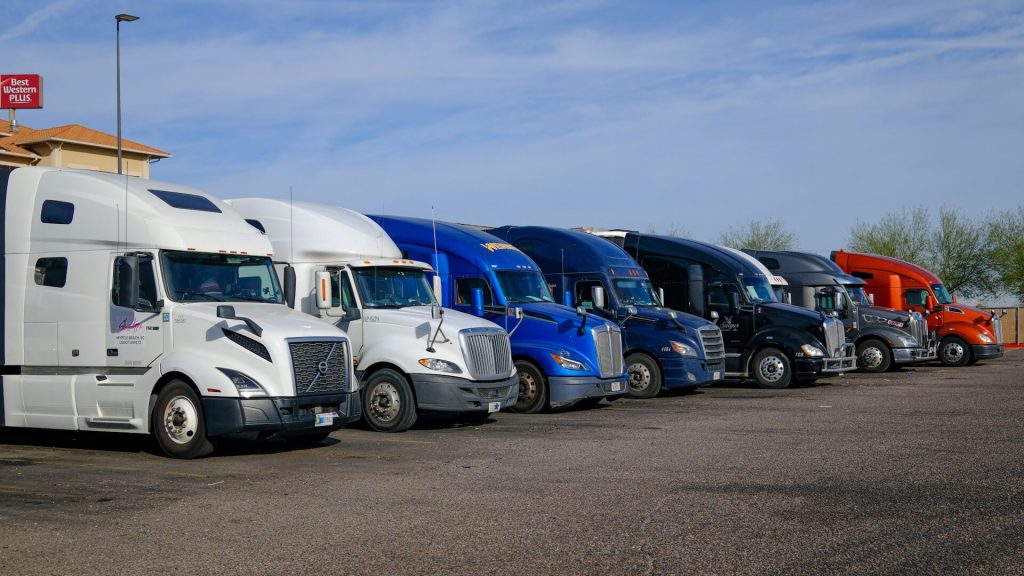 cargo trucks parked in a row