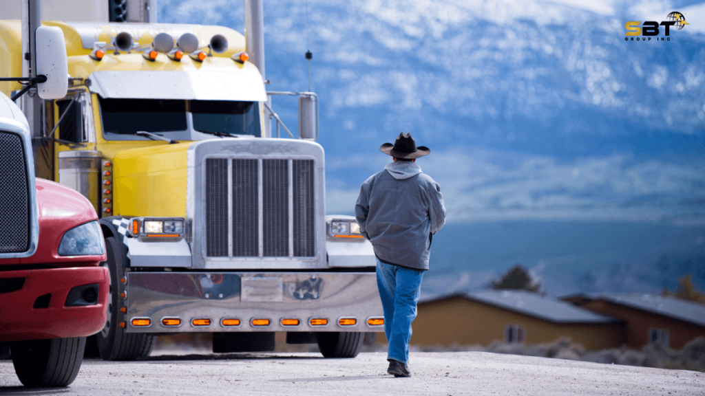man in front of cargo truck